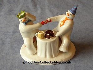 Coalport Pulling A Cracker Snowman quality figurine