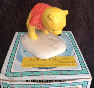 Royal Doulton Winnie The Pooh And The Paw Marks  quality figurine